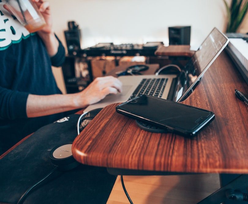 a person using a laptop with piano