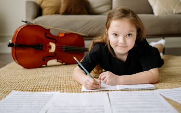 violin student studying music theory
