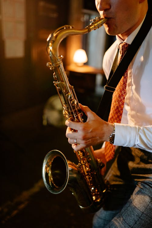 A man playing the saxophone