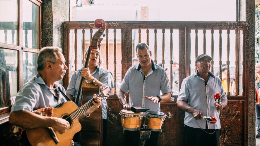 A band of musicians playing instruments together