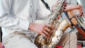 A person playing a saxophone